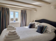 Boat House double bedroom with double bed and window