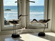 Window with bird ornaments